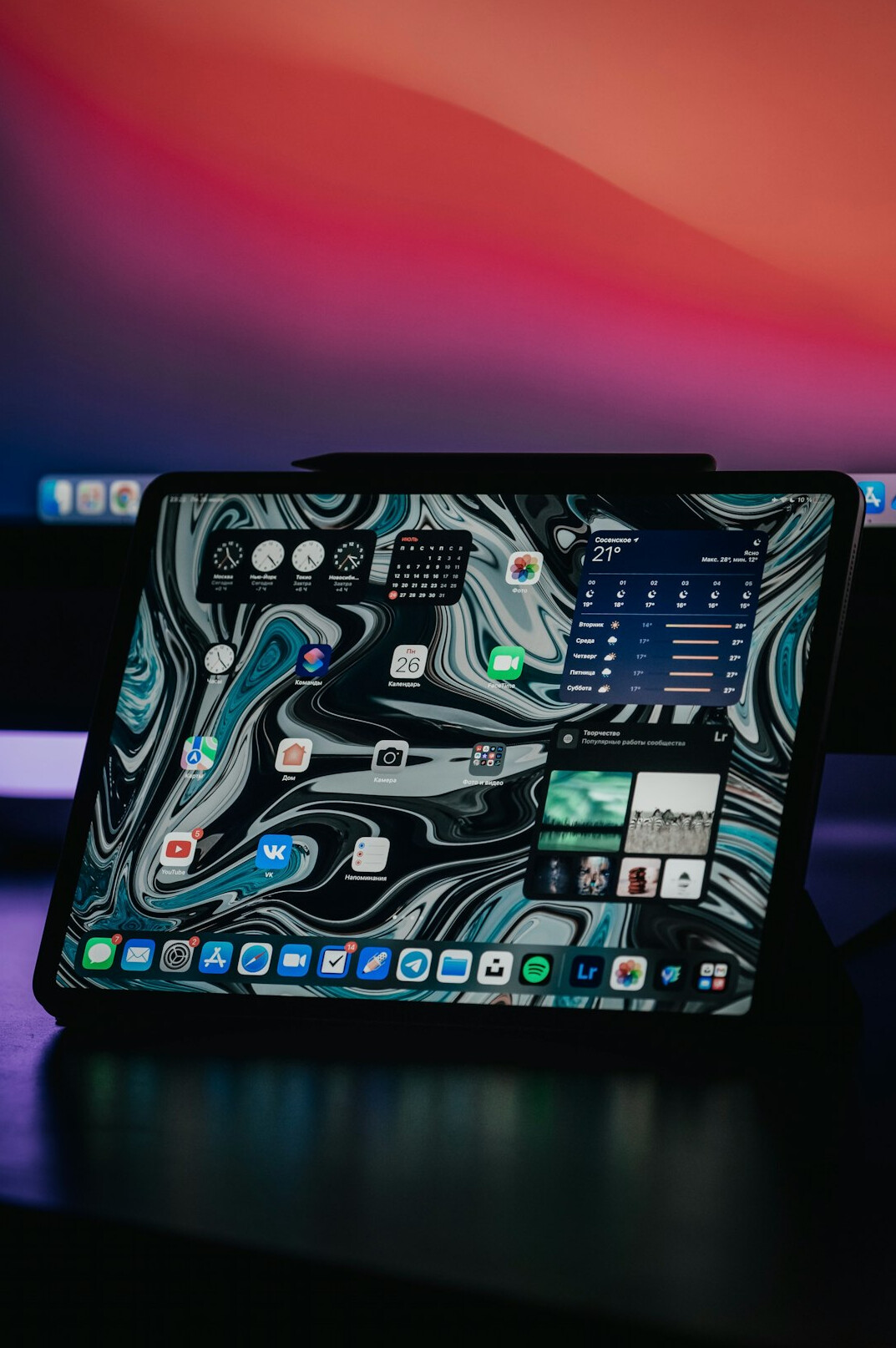 Laptop with charts on a desk